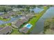 Aerial view of a waterfront community featuring a pool, lovely landscaping and convenient parking at 3119 Glen Elyn Blvd # 9, Sarasota, FL 34237