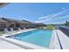 Enjoy community pool with clear blue water and ample space for lounging at 3119 Glen Elyn Blvd # 9, Sarasota, FL 34237