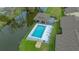 Enjoy community pool with water views, decking and plentiful lounge chairs at 3119 Glen Elyn Blvd # 9, Sarasota, FL 34237