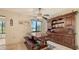 Dining area features a wooden table and chairs, plus a decorative china cabinet at 3119 Glen Elyn Blvd # 9, Sarasota, FL 34237