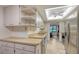Bright kitchen features stainless steel appliances, ample storage and natural lighting at 3119 Glen Elyn Blvd # 9, Sarasota, FL 34237