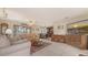 Bright living room features tile flooring, comfortable seating, and decorative furnishings at 3119 Glen Elyn Blvd # 9, Sarasota, FL 34237