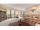 Bright living room with tile floors, large window, comfortable seating, and stylish decor at 3119 Glen Elyn Blvd # 9, Sarasota, FL 34237
