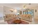 Spacious living room offering tile floors, comfortable seating, and natural light at 3119 Glen Elyn Blvd # 9, Sarasota, FL 34237