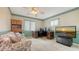 Cozy room featuring neutral paint, floral sofa, desk and tv at 3119 Glen Elyn Blvd # 9, Sarasota, FL 34237