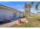 Charming outdoor patio with bistro set, perfect for enjoying morning coffee or evening cocktails at 3672 Pine Rd, Venice, FL 34293