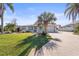 Charming single-story home with well manicured lawn and beautiful landscaping at 3672 Pine Rd, Venice, FL 34293