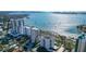 Stunning aerial view of a building with water views and surrounding cityscape at 435 S Gulfstream Ave # 804, Sarasota, FL 34236