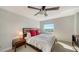 Bedroom featuring a large window and a comfortable bed at 435 S Gulfstream Ave # 804, Sarasota, FL 34236