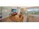 Cozy living room featuring hardwood floors, a sofa set, built-in shelves, and city views at 435 S Gulfstream Ave # 804, Sarasota, FL 34236