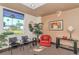 Lobby with a red chair, black chairs, and outdoor view from a window at 435 S Gulfstream Ave # 804, Sarasota, FL 34236