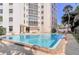 Large outdoor pool with lounge chairs and views of the high-rise building at 435 S Gulfstream Ave # 804, Sarasota, FL 34236