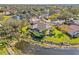 Waterfront home with screened-in pool and tranquil pond views at 4477 White Cedar Trl, Sarasota, FL 34238