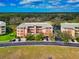 A vibrant view of the community and surrounding greenery from an aerial perspective at 5246 Manorwood Dr # 4, Sarasota, FL 34235