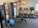 Well-equipped fitness center with treadmills, weight machines, and exercise accessories at 5246 Manorwood Dr # 4, Sarasota, FL 34235