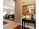 A foyer with tile floors and a view of the dining and living areas at 5246 Manorwood Dr # 4, Sarasota, FL 34235