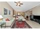 Spacious living area featuring sleek furnishings, tile flooring, and natural light at 5246 Manorwood Dr # 4, Sarasota, FL 34235