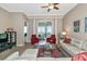 A contemporary living room that includes outdoor balcony and stylish furnishings at 5246 Manorwood Dr # 4, Sarasota, FL 34235