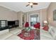 A comfortable living room with an accent rug and inviting seating areas at 5246 Manorwood Dr # 4, Sarasota, FL 34235