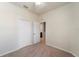Neutral bedroom featuring carpet floors, a ceiling fan, and a closet at 5435 Soapstone Place # 22-103, Sarasota, FL 34233