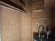 Functional utility area with shelving, water heater, and necessary connections at 6024 Arlene Way, Bradenton, FL 34207