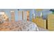 Bright bedroom featuring a full dresser set and coastal decor at 6116 43Rd W St # 204D, Bradenton, FL 34210