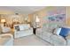Cozy living room featuring comfortable seating and an open layout to the dining area at 6116 43Rd W St # 204D, Bradenton, FL 34210