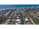 Waterfront home with boat dock situated along canal with beach and ocean views at 619 Buttonwood Dr, Longboat Key, FL 34228