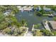 Aerial view of property showing private boat dock, boat ramp and beautiful waterfront access at 619 Buttonwood Dr, Longboat Key, FL 34228