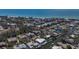 Waterfront home with dock located on a canal near the ocean in a residential neighborhood at 619 Buttonwood Dr, Longboat Key, FL 34228