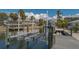 Boat lift on the water, with views of the intercoastal at 619 Buttonwood Dr, Longboat Key, FL 34228