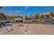 Dockside view of a home with a fire pit and lawn chairs at 619 Buttonwood Dr, Longboat Key, FL 34228
