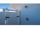 Outdoor shower fixture on the side of a building at 619 Buttonwood Dr, Longboat Key, FL 34228
