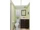 This is a well lit bathroom with a sleek vanity and fixtures and a walk in shower at 649 S Tamiami Trl # 210, Venice, FL 34285