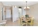 Dining area showcasing closet and opening to the kitchen at 649 S Tamiami Trl # 210, Venice, FL 34285