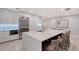 Gourmet kitchen with large island, stainless steel appliances, and plenty of cabinet space at 650 Golden Gate Pt # 403, Sarasota, FL 34236