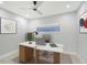 Contemporary office space with neutral walls, stylish furnishings, and natural light at 650 Golden Gate Pt # 403, Sarasota, FL 34236