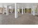 Ground floor space with a concrete floor, columns, and lattice; suitable for storage or recreation at 650 Penfield St, Longboat Key, FL 34228