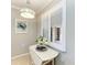 Breakfast nook with white plantation shutters and seating area at 7019 River Hammock Dr # 104, Bradenton, FL 34212