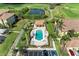 Aerial view of community pool, landscaping and green spaces at 7019 River Hammock Dr # 104, Bradenton, FL 34212