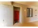 Apartment front door on a nicely maintained hallway with good lighting at 7019 River Hammock Dr # 104, Bradenton, FL 34212