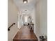 Hallway leading to the front door at 7340 Golf Pointe Cir, Sarasota, FL 34243