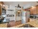 Bright kitchen with a wine refrigerator and stylish decorative accents at 7340 Golf Pointe Cir, Sarasota, FL 34243
