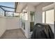 Enclosed outdoor patio perfect for grilling at 7340 Golf Pointe Cir, Sarasota, FL 34243