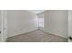 Bedroom with neutral carpet and a window for natural light at 7632 Plantation Cir, Bradenton, FL 34201