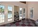 Well-equipped gym space with weights, machines, and glass doors leading to the pool area at 7632 Plantation Cir, Bradenton, FL 34201
