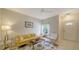 Bright living room features modern decor, neutral walls, and tiled flooring at 7632 Plantation Cir, Bradenton, FL 34201