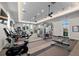 Well-equipped fitness center with various exercise machines and plenty of natural light at 8271 Redonda Loop, Lakewood Ranch, FL 34202
