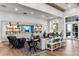 Bright living room with TV and decorative shelving at 8271 Redonda Loop, Lakewood Ranch, FL 34202