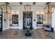 Beautiful lobby with wood flooring, light fixtures and comfortable seating at 8271 Redonda Loop, Lakewood Ranch, FL 34202